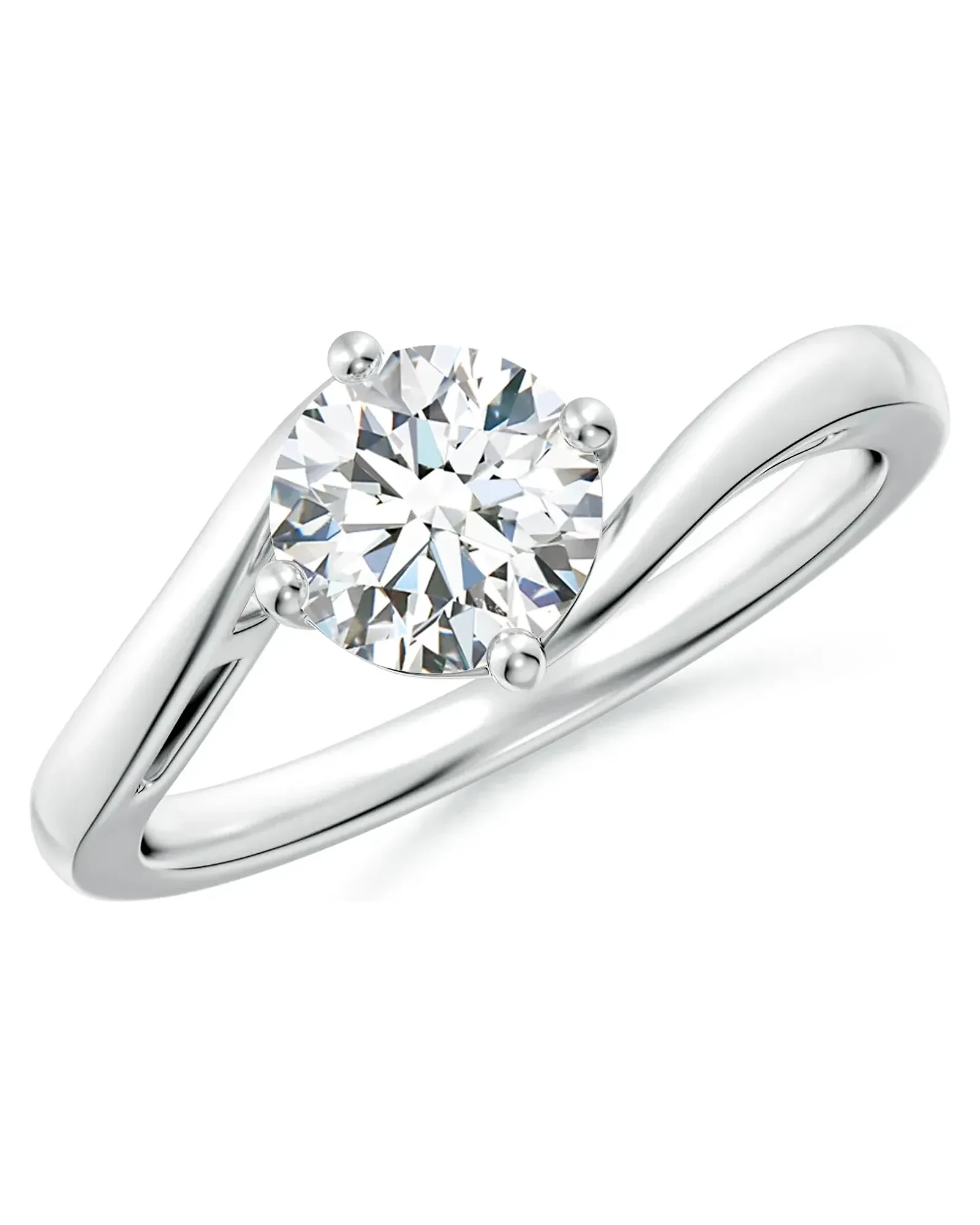 A one carat round brilliant diamond held in the gap of a bypass shank, in 14ct white gold